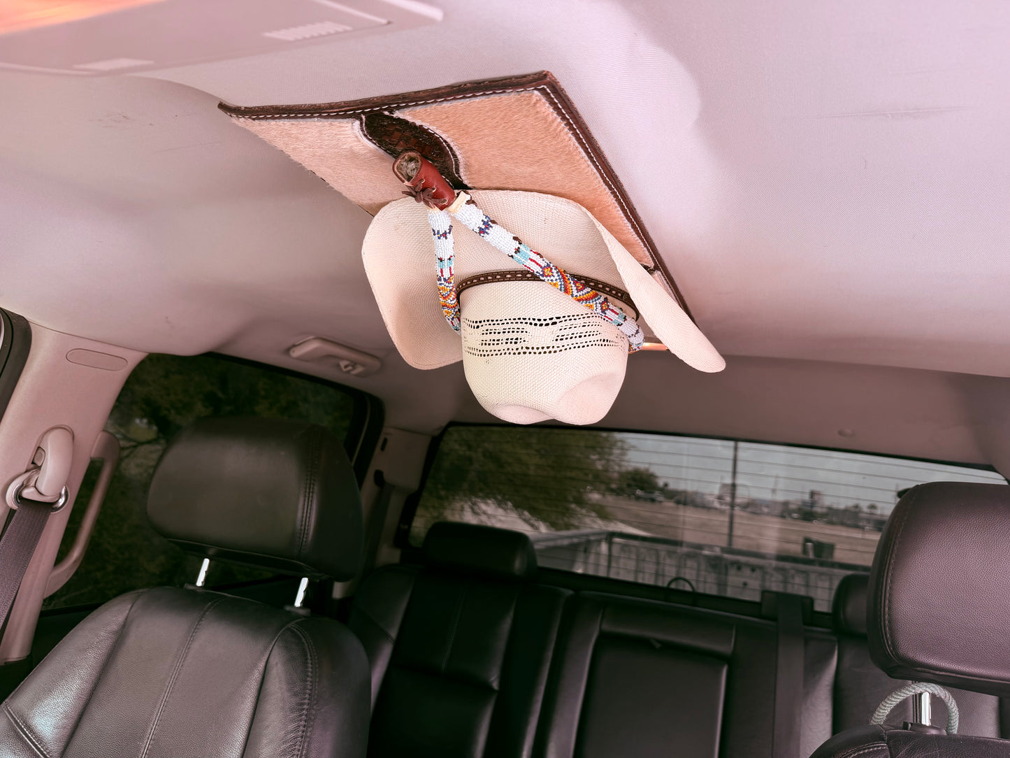 Jesse Marroquin’s Americana Gun Holster Cowboy Hat Rack