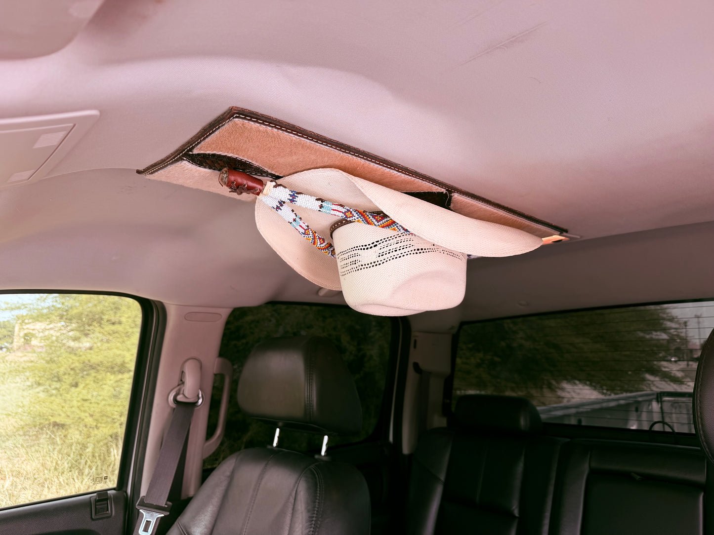 Jesse Marroquin’s Americana Gun Holster Cowboy Hat Rack