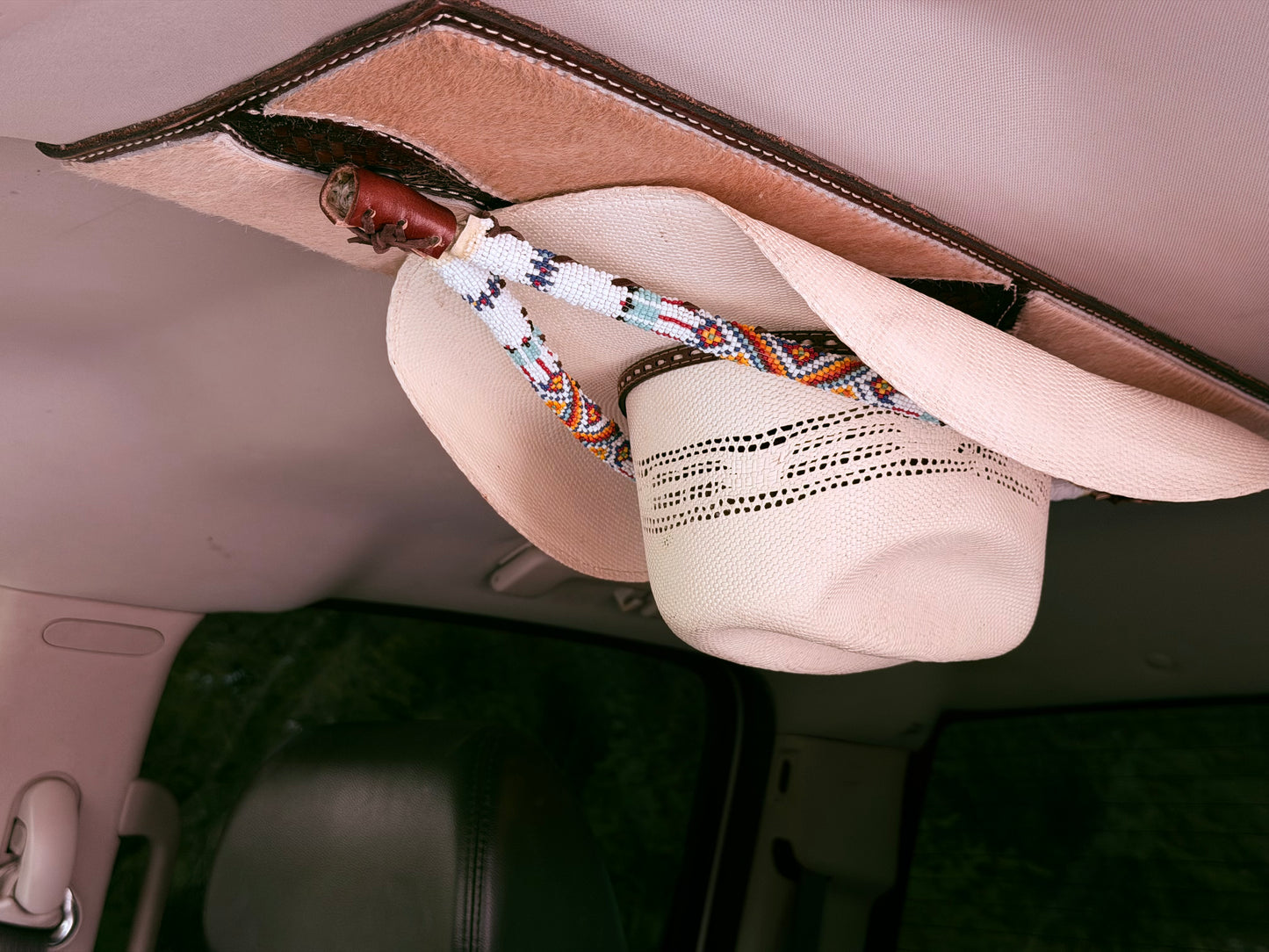 Jesse Marroquin’s Americana Gun Holster Cowboy Hat Rack